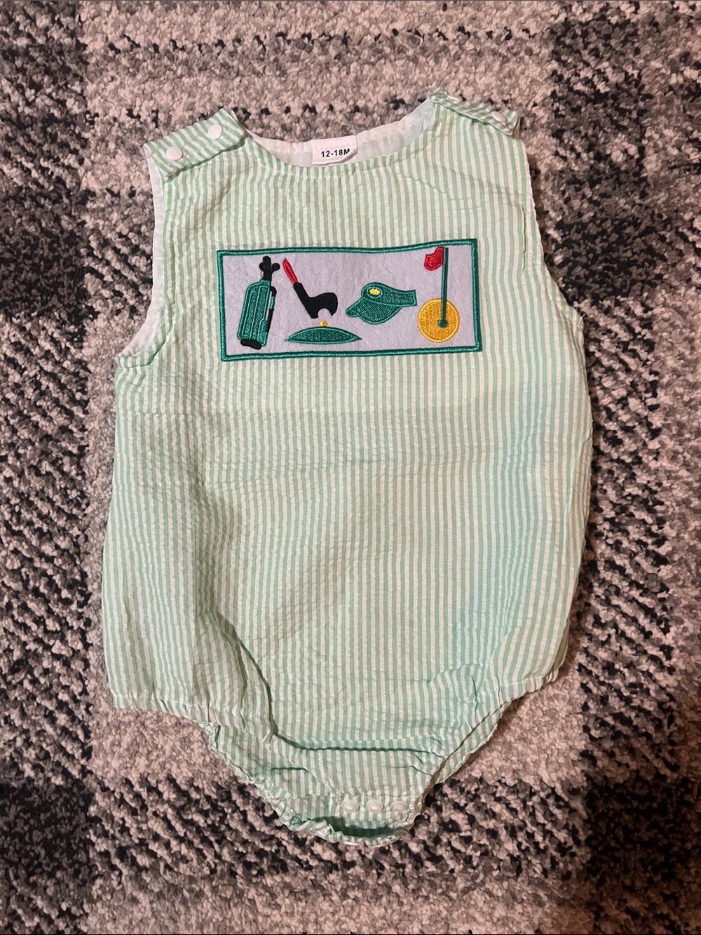 Green striped embroidered golf baby onesie